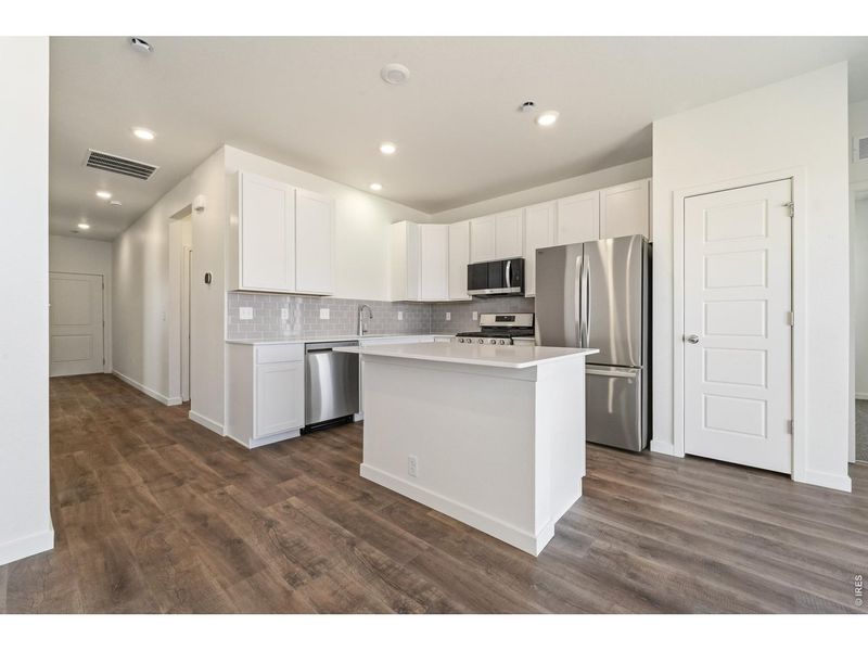 Furnished interior view inside a new home in Liberty Draw, Evans (Image 6).