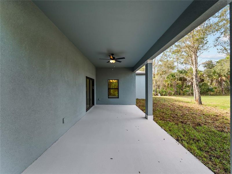 Exterior details and patio area of a home in , North Port (Image 32).