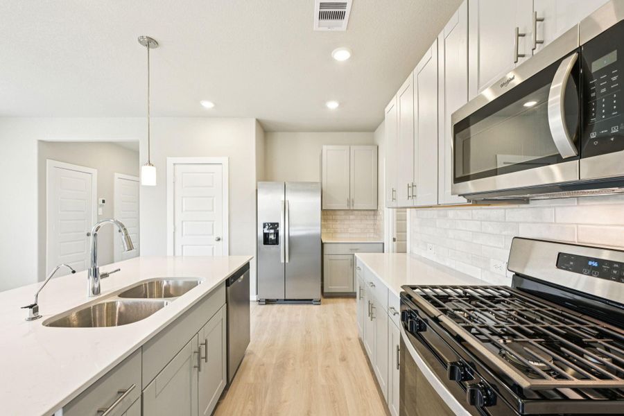 Photo is not of the actual home, but is an inspirational photo of builder’s model home and may depict options, furnishings, and/or decorator features that are not included