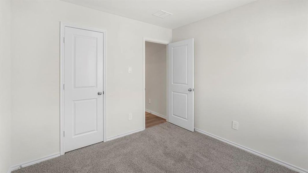 Light grey wall paint with coordinating baseboards