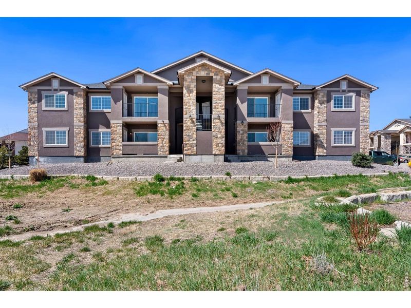 Front exterior of a new home in , Denver, CO, highlighting curb appeal (Image 26).
