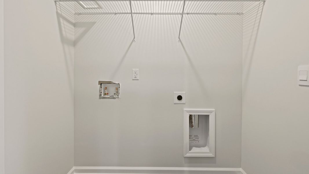 Representative unfurnished interior of a home built from the MURRAY TH by D.R. Horton in Pine Hills Townhomes at Cane Bay, Summerville (Image 33).