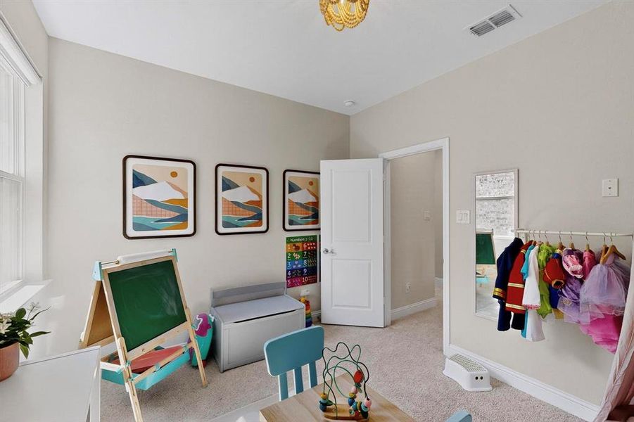 Game room with carpet flooring and baseboards Game room with carpet flooring and baseboards