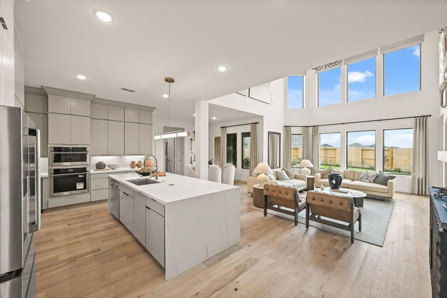 The large kitchen area provides space for a breakfast table. Representative image.