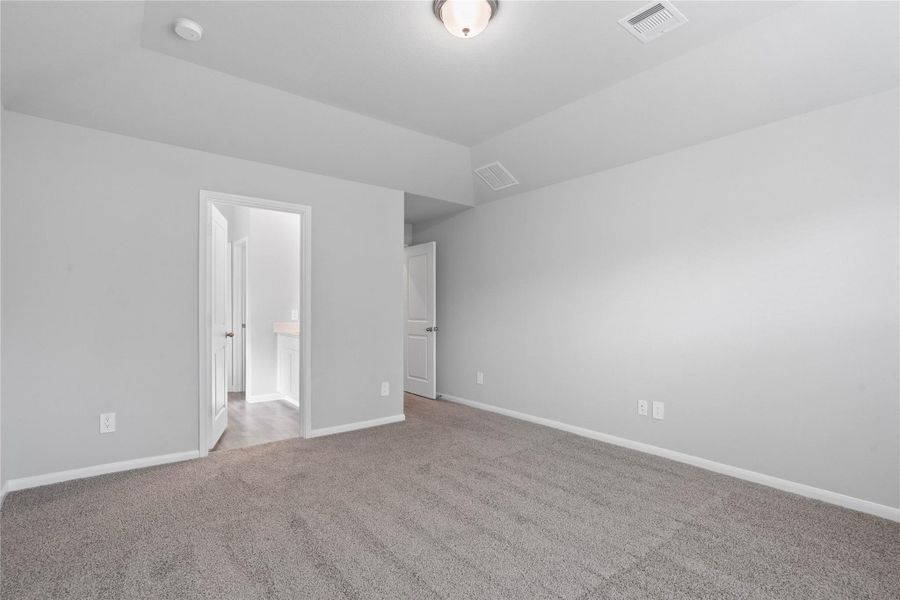 The private primary suite efficiently connects the sleeping area with the dedicated bathroom and generous closet. The private primary suite efficiently connects the sleeping area with the dedicated bathroom and generous closet.