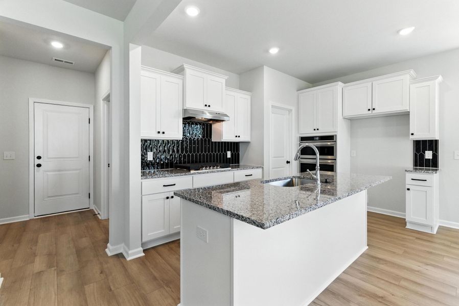 Furnished interior view inside a new home in Six Oaks, Summerville (Image 9).