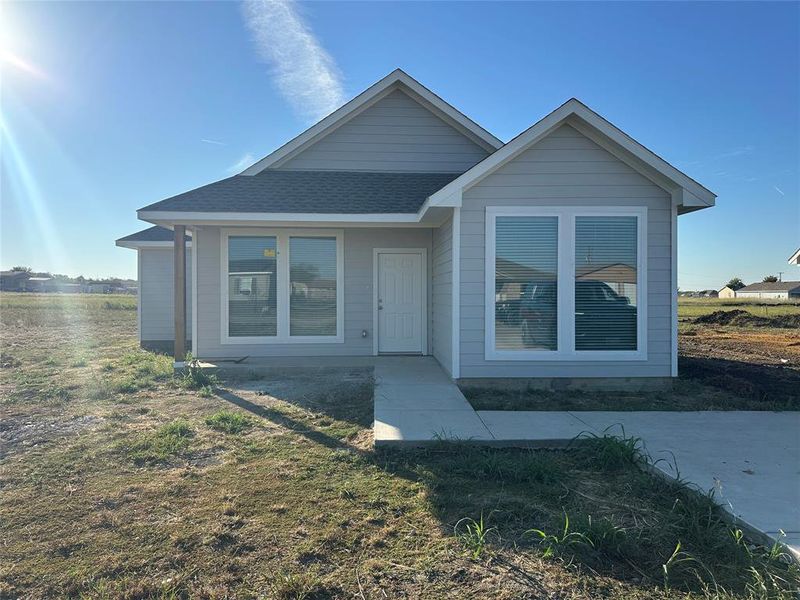 Bungalow-style house featuring roof with shingles Bungalow-style house featuring roof with shingles