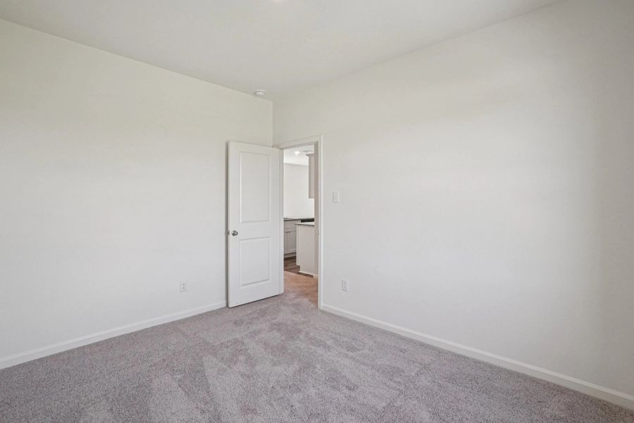 Representative unfurnished interior of a home built from the Odyssey by Starlight Homes in Williams Landing, Waller (Image 15).