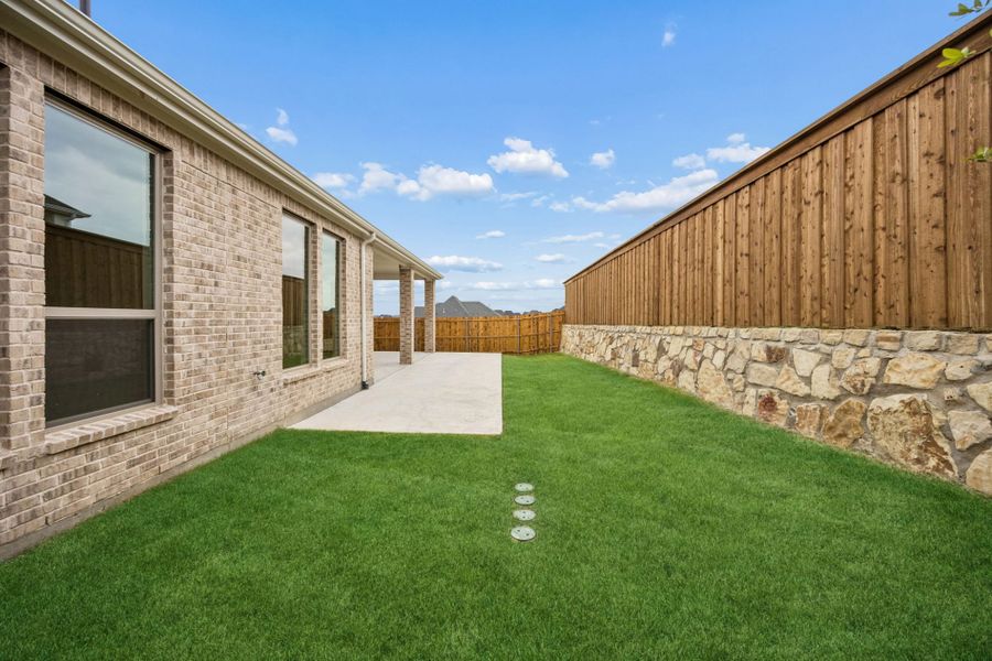 Exterior details and patio area of a home in Mustang Lakes, Celina (Image 26).