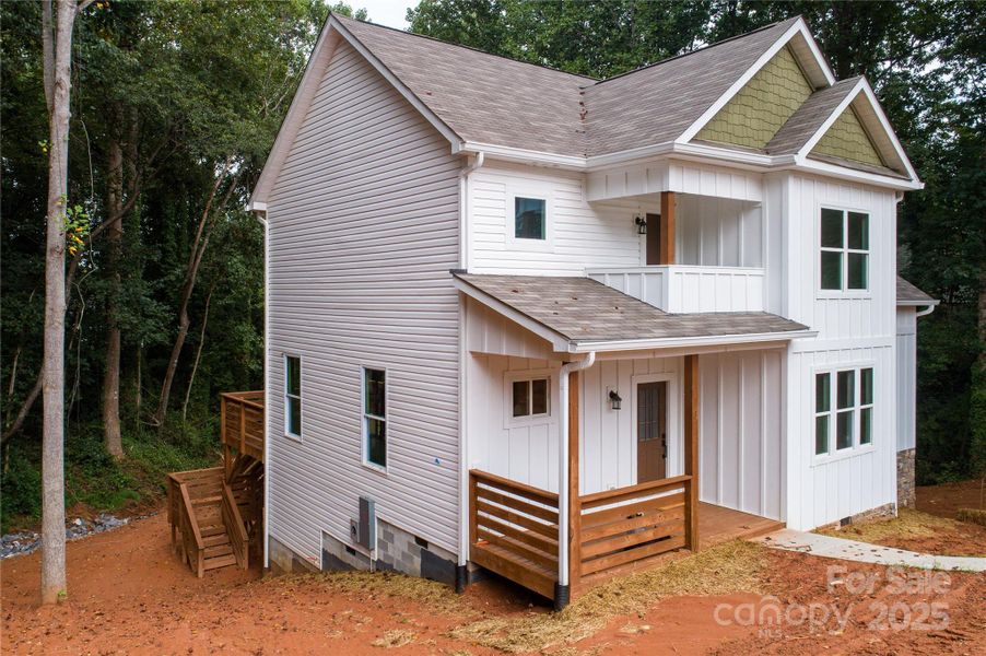 Front exterior of a new home in , Hickory, NC, highlighting curb appeal (Image 15).