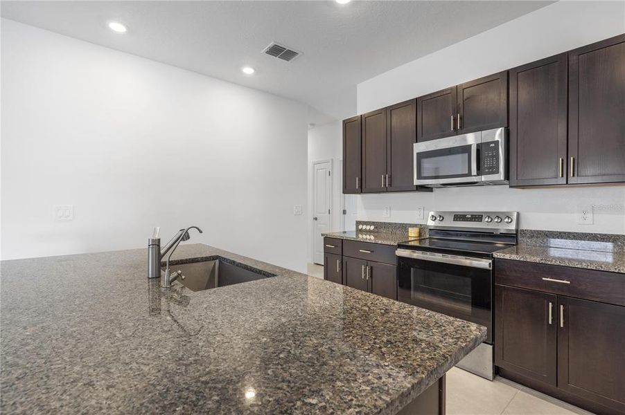 Furnished interior view inside a new home in Wind Meadows South, Bartow (Image 40).
