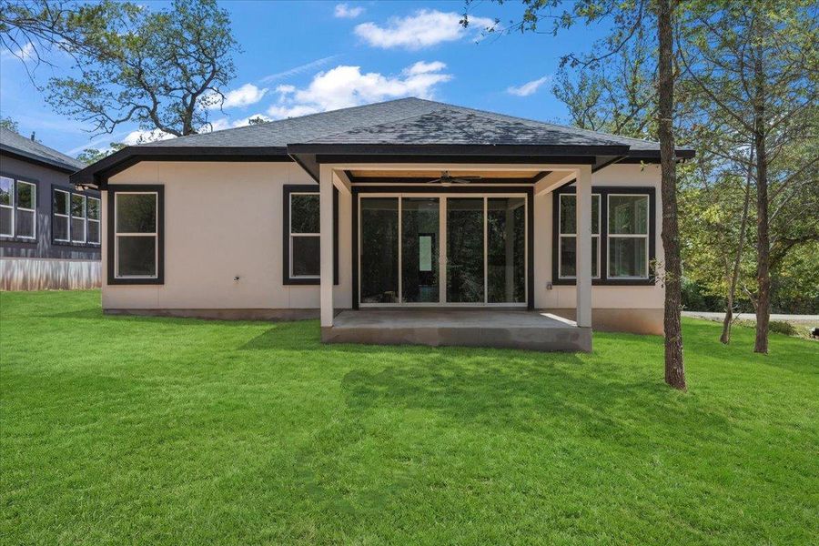 Exterior details and patio area of a home in , Bastrop (Image 23).