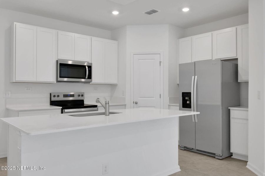 Furnished interior view inside a new home in Atlantis Pointe, Middleburg (Image 5).