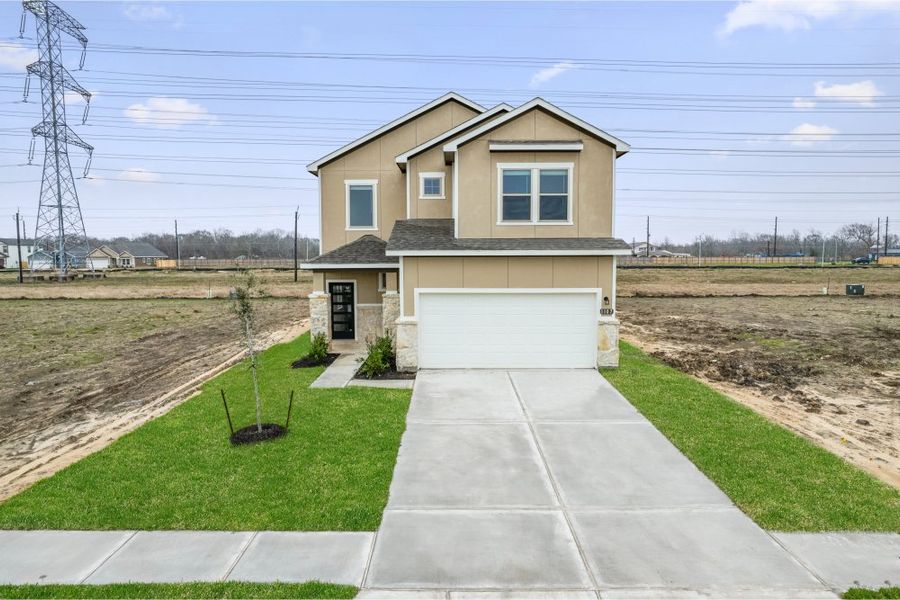 Front exterior of a new home in Glendale Lakes, Rosharon, TX, highlighting curb appeal (Image 28). Front exterior of a new home in Glendale Lakes, Rosharon, TX, highlighting curb appeal (Image 28).