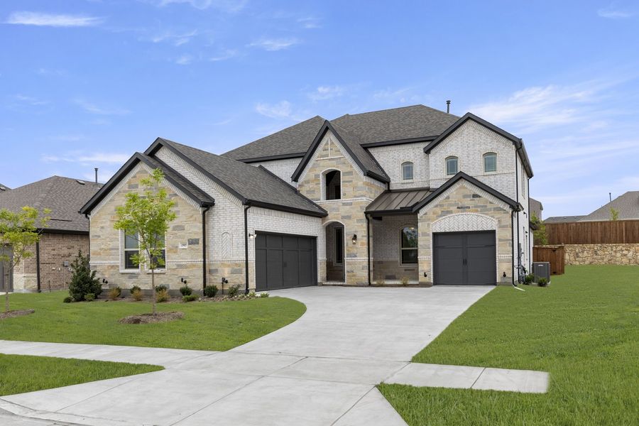 Front exterior of a new home in Brookshire at Legacy Hills, Celina, TX, highlighting curb appeal (Image 2). Front exterior of a new home in Brookshire at Legacy Hills, Celina, TX, highlighting curb appeal (Image 2).