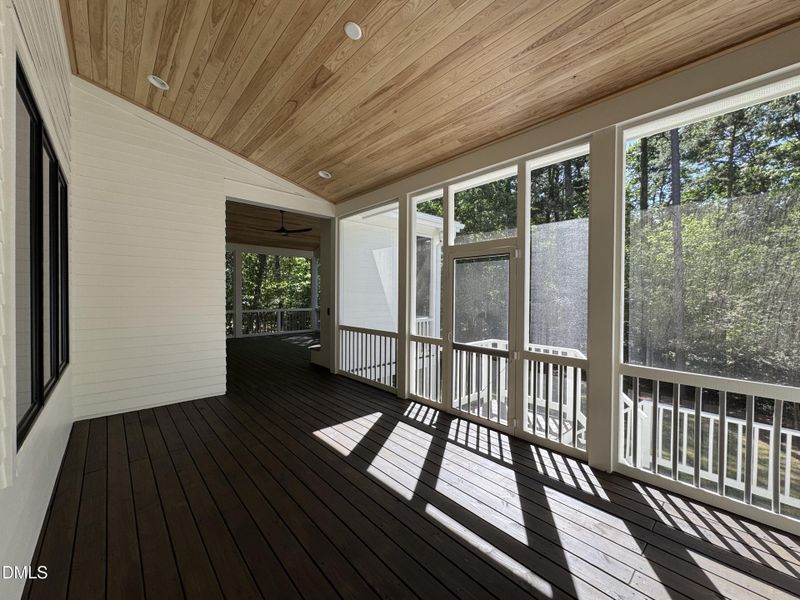 Screened porch dining area