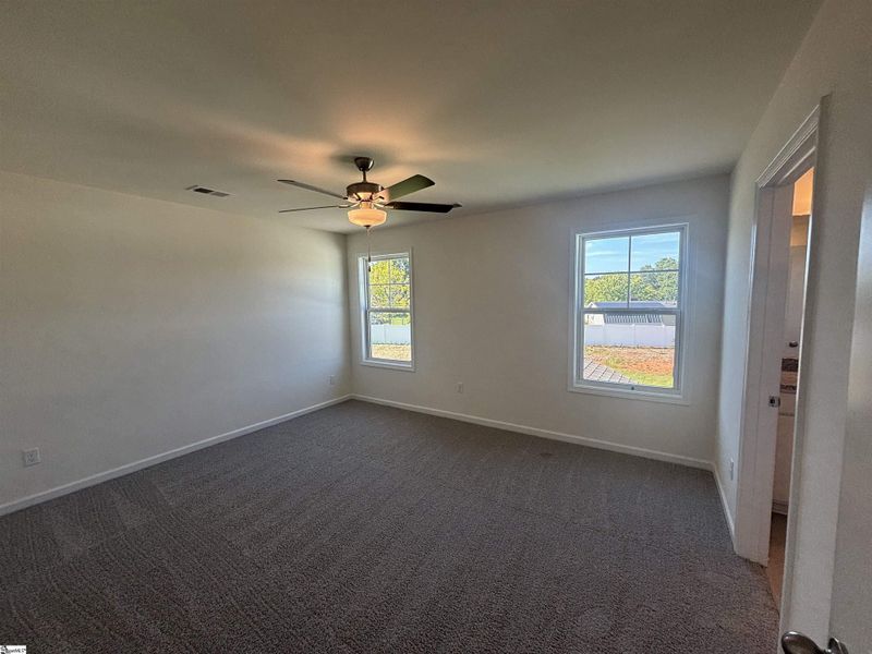 Spacious, unfurnished interior of a new home in Halton Oaks, Spartanburg (Image 13).
