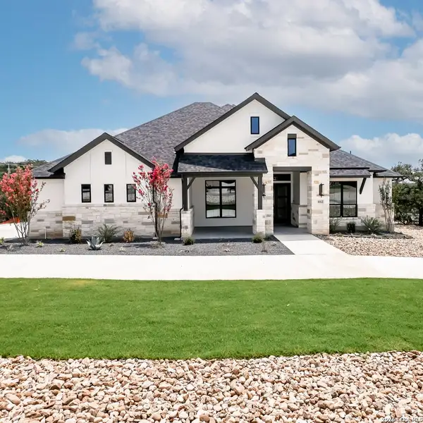 Front exterior of a new home in The Preserve at Elm Creek, New Braunfels, TX, highlighting curb appeal (Image 22).