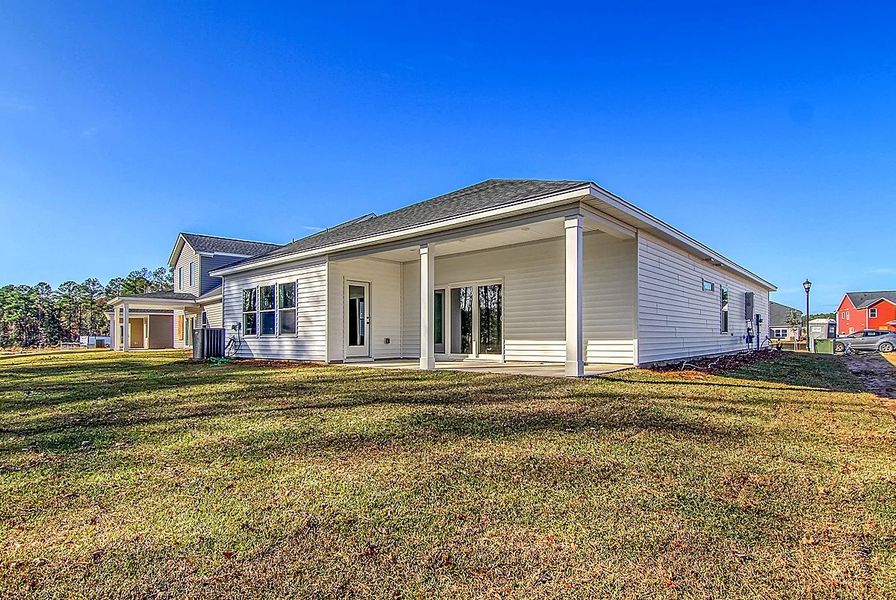 Representative exterior photo of a completed home built from the Truman by Ashton Woods in Watson Hill, Summerville, SC (Image 15).