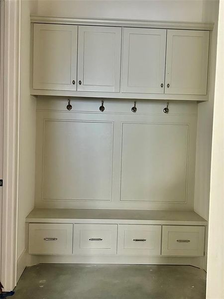 Mudroom between the garage and utility room