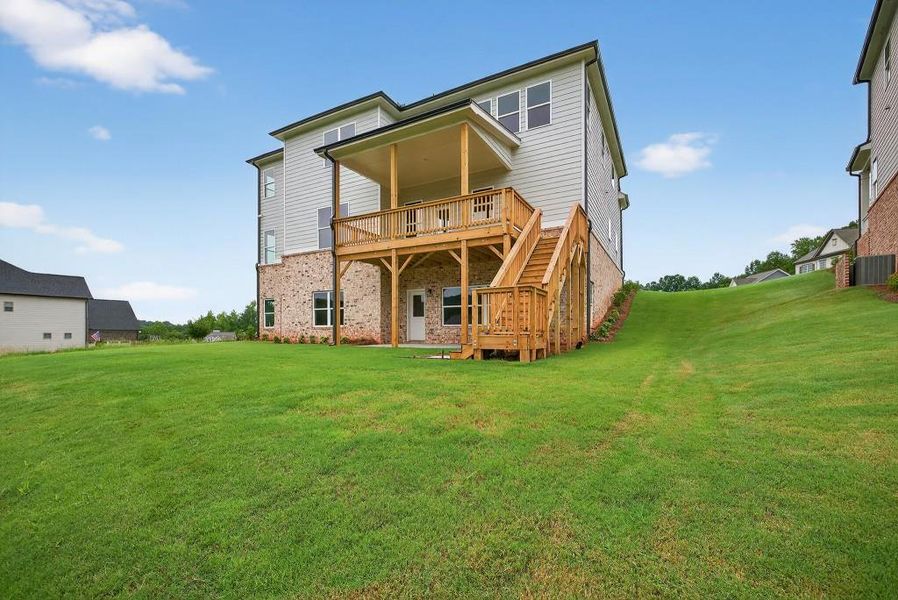 Front exterior of a new home in Traditions Of Braselton, Jefferson, GA, highlighting curb appeal (Image 28). Front exterior of a new home in Traditions Of Braselton, Jefferson, GA, highlighting curb appeal (Image 28).