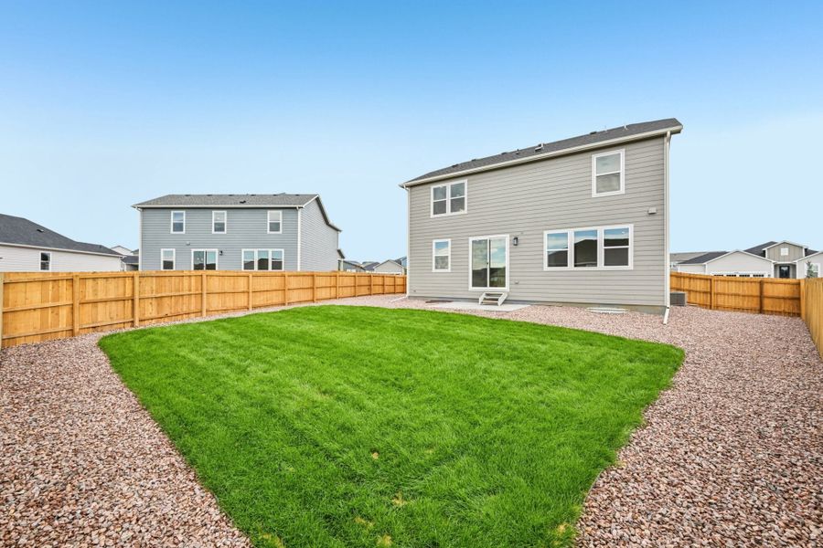 Exterior details and patio area of a home in The Glen, Colorado Springs (Image 27). Exterior details and patio area of a home in The Glen, Colorado Springs (Image 27).