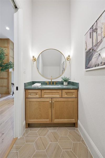Bathroom featuring vanity and light tile patterned floors