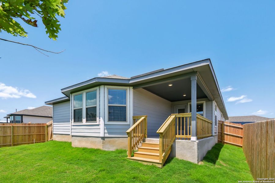Front exterior of a new home in Catalina, Converse, TX, highlighting curb appeal (Image 21).