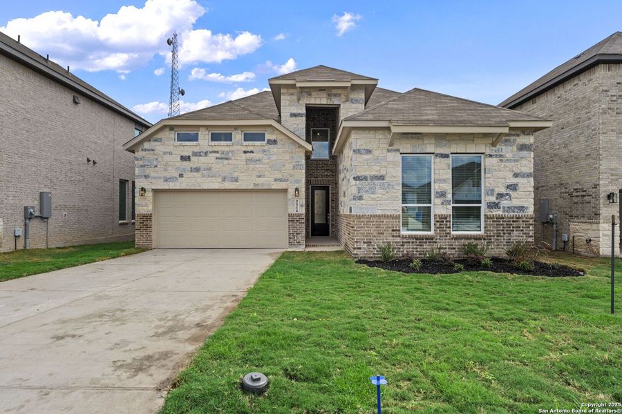 Front exterior of a new home in , New Braunfels, TX, highlighting curb appeal (Image 1).
