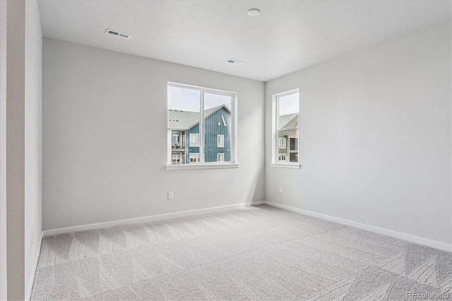 Spacious, unfurnished interior of a new home in Paired Homes at Alder Creek, Parker (Image 19).