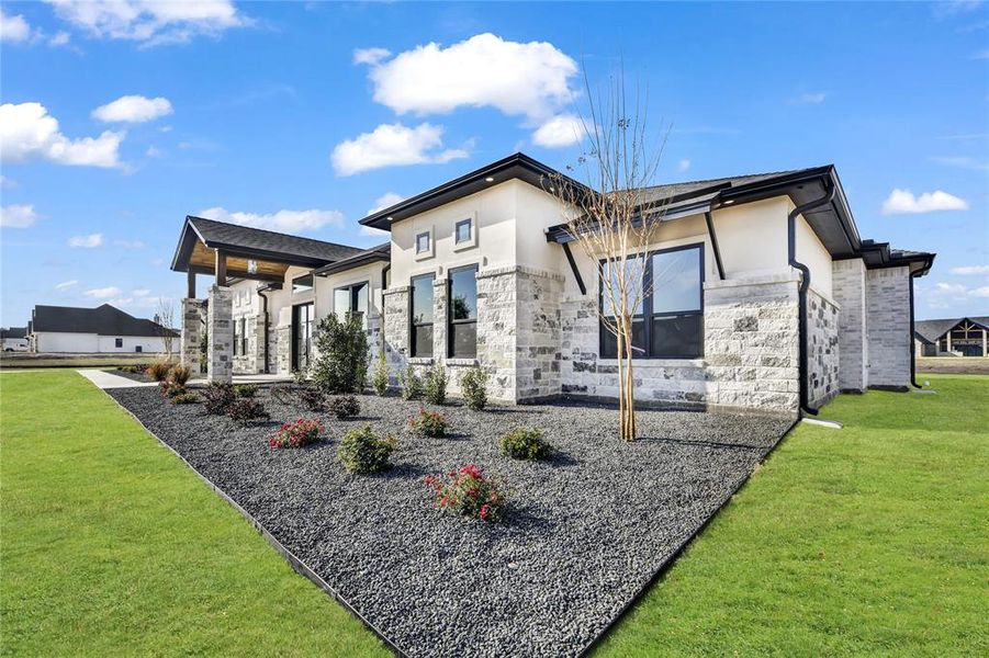 Front exterior of a new home in , Aledo, TX, highlighting curb appeal (Image 26).