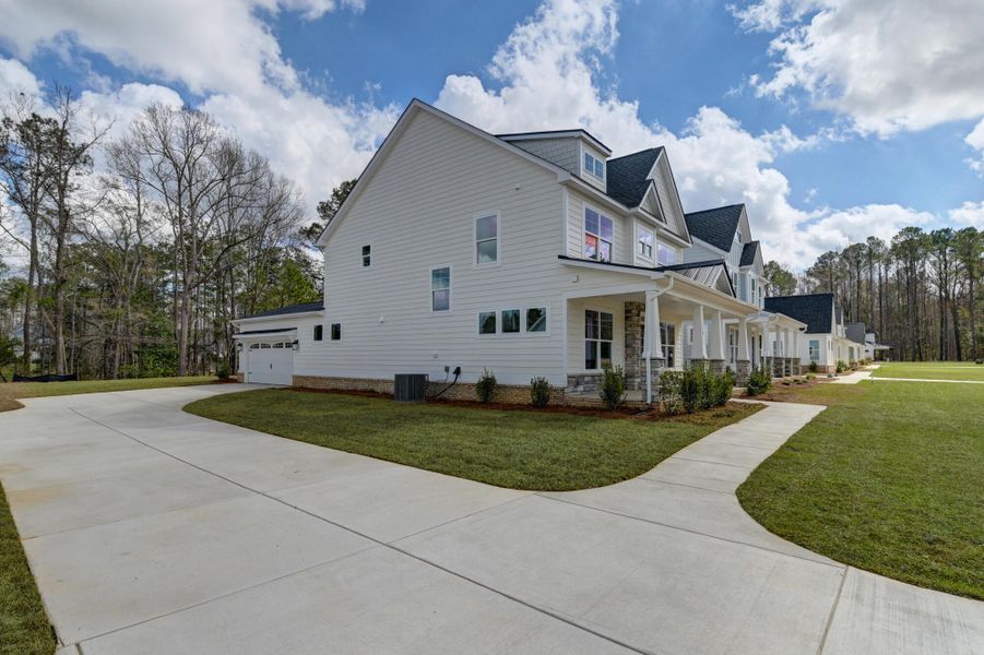Front exterior of a new home in Clubside Reserve at Summerlake, Lexington, SC, highlighting curb appeal (Image 20).