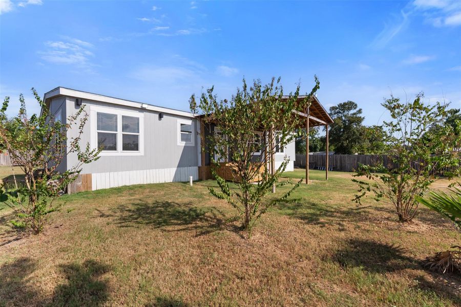 Exterior details and patio area of a home in , Conroe (Image 20).