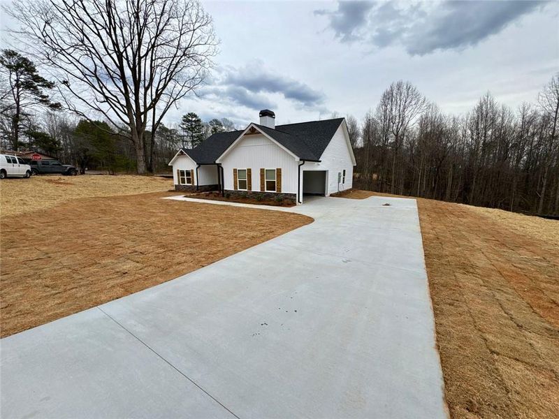 Front exterior of a new home in , Clarkesville, GA, highlighting curb appeal (Image 18).