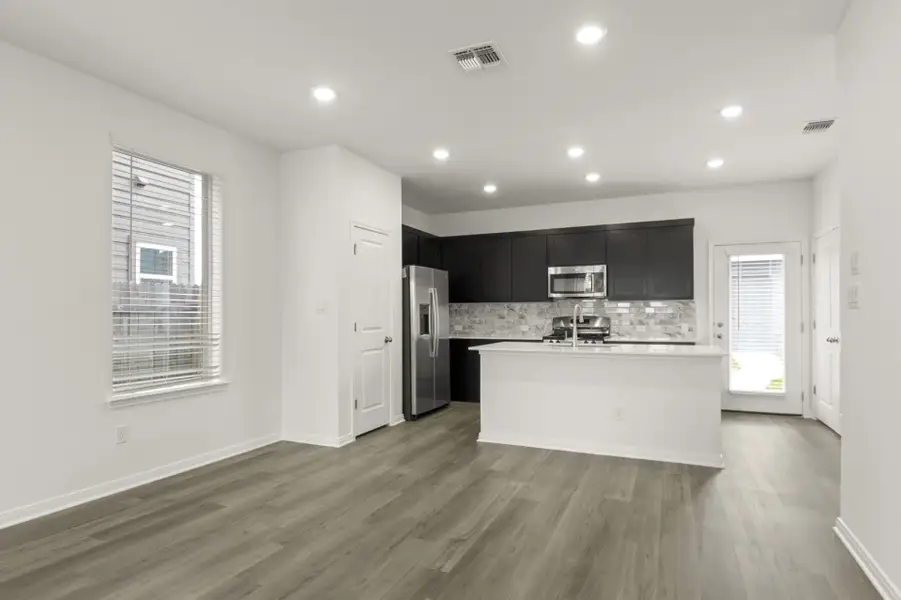 Furnished interior view inside a new home in Trace, San Marcos (Image 11).