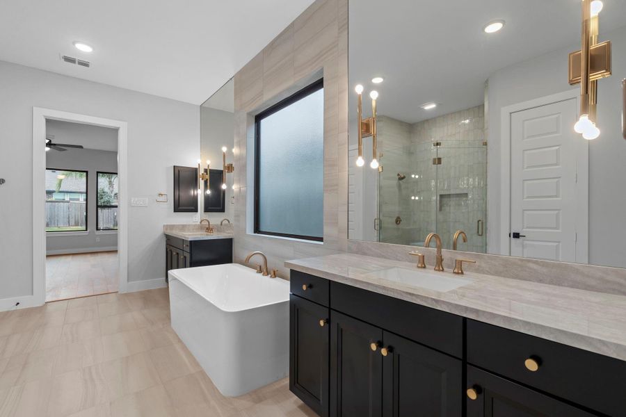 The Main Bath features a free-standing tub beckoning you for a soak at the end of the day.