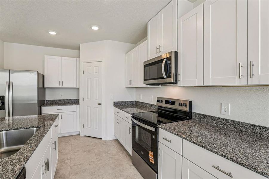Furnished interior view inside a new home in Lawson Dunes - Signature Series, Haines City (Image 16). Furnished interior view inside a new home in Lawson Dunes - Signature Series, Haines City (Image 16).