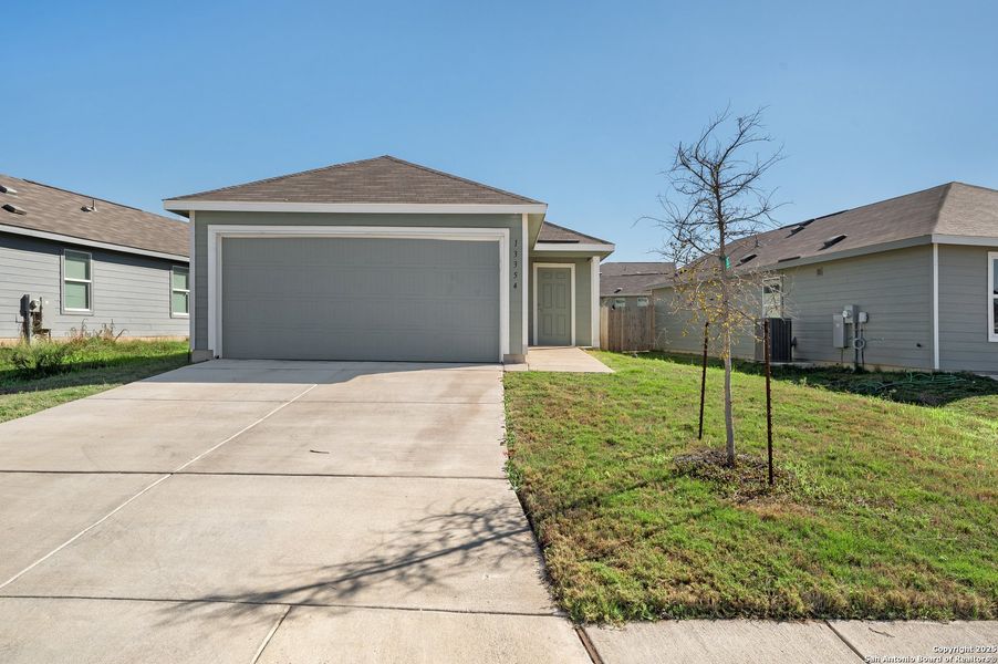 Front exterior of a new home in , San Antonio, TX, highlighting curb appeal (Image 17).