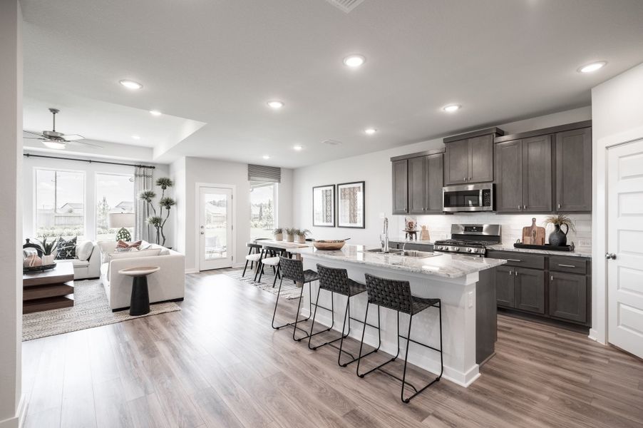 Representative furnished interior of a home built from the Yellowstar by Tri Pointe Homes in Mason Woods, Cypress (Image 7).
