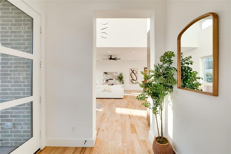 Hall with light wood-type flooring