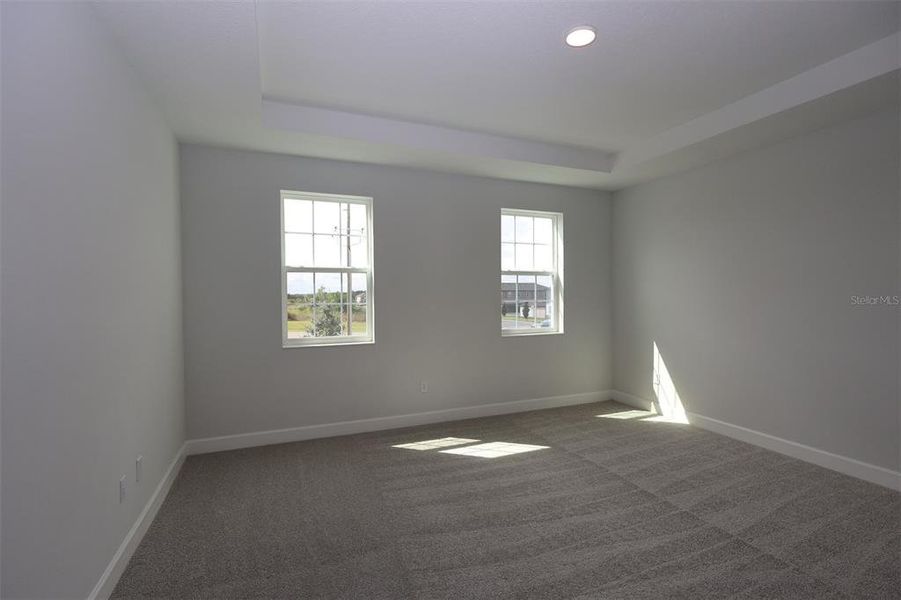 Spacious, unfurnished interior of a new home in Lake Star at Ovation, Winter Garden (Image 19).