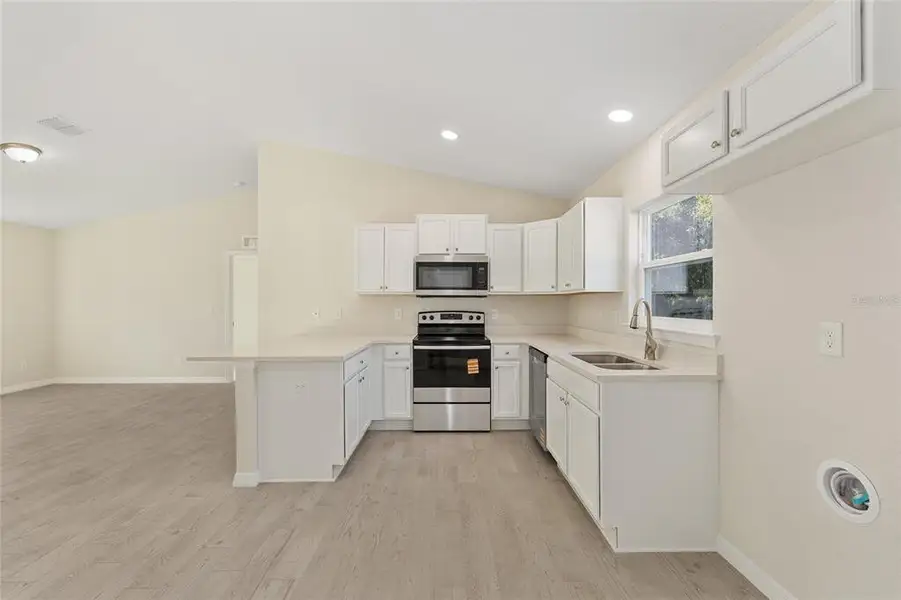 Furnished interior view inside a new home in , Ocala (Image 6).