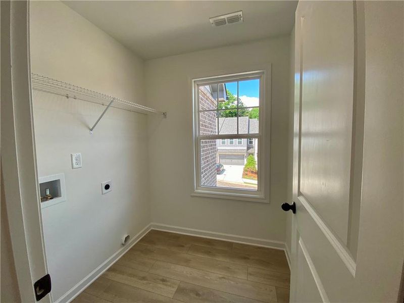 Spacious, unfurnished interior of a new home in Eastlyn Crossing, Flowery Branch (Image 26).