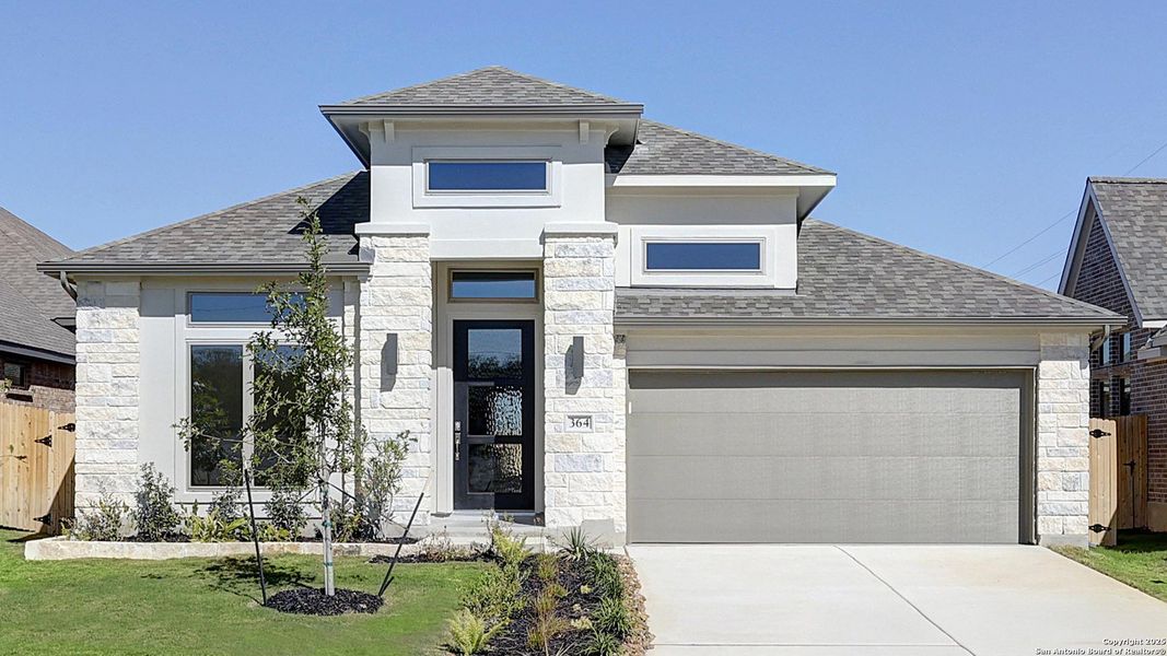 Front exterior of a new home in Haby Hill 50', San Antonio, TX, highlighting curb appeal (Image 2).
