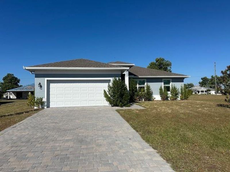 Front exterior of a new home in , Punta Gorda, FL, highlighting curb appeal (Image 16). Front exterior of a new home in , Punta Gorda, FL, highlighting curb appeal (Image 16).