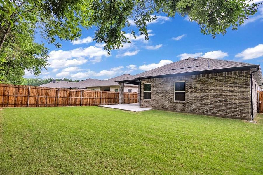 View of yard featuring a patio area View of yard featuring a patio area