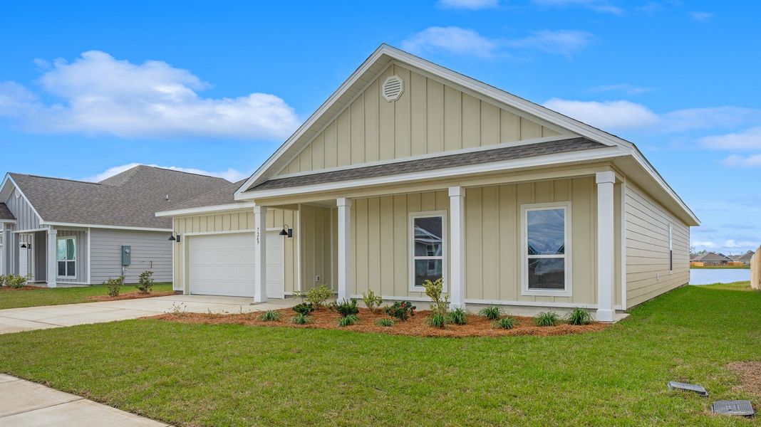 Front exterior of a new home in Hodges Bayou Plantation, Panama City, FL, highlighting curb appeal (Image 19). Front exterior of a new home in Hodges Bayou Plantation, Panama City, FL, highlighting curb appeal (Image 19).