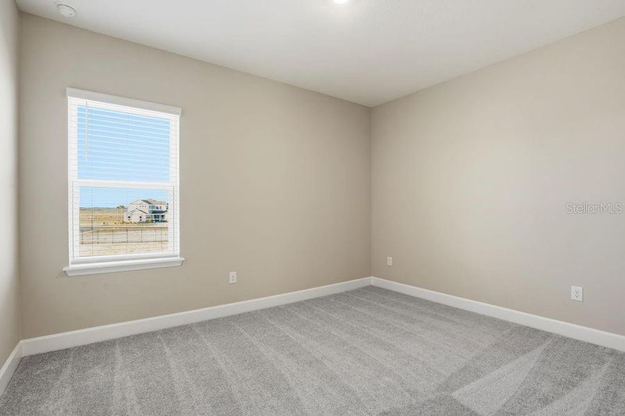 Spacious, unfurnished interior of a new home in Palms at Coasterra, Palmetto (Image 31).
