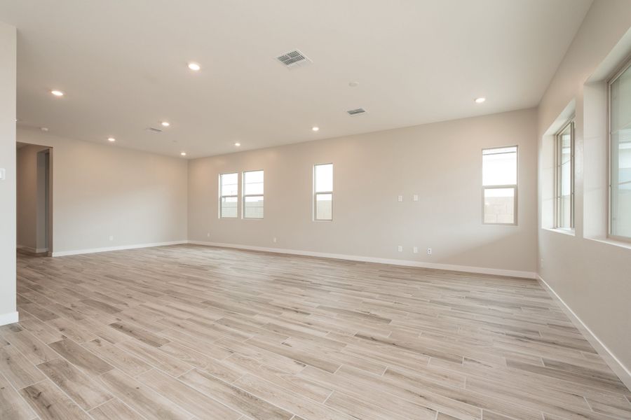 Spacious, unfurnished interior of a new home in Waterston Central, Gilbert (Image 12).