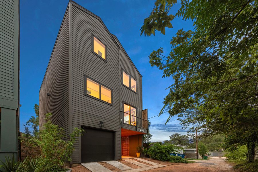 Front exterior of a new home in , Austin, TX, highlighting curb appeal (Image 1). Front exterior of a new home in , Austin, TX, highlighting curb appeal (Image 1).